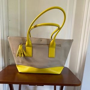 Kate Spade tan & yellow tote, zipper top, zip front pocket with tassel.